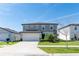 Charming two-story home with well-kept lawn, two-car garage, and classic curb appeal at 5531 Keaton Springs Dr, Lakeland, FL 33811