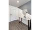 Bright foyer with hardwood floors and modern decor including stylish table at 5531 Keaton Springs Dr, Lakeland, FL 33811