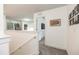 Upstairs hallway with neutral carpet and light walls create a bright and welcoming space at 5531 Keaton Springs Dr, Lakeland, FL 33811