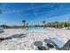 Expansive community pool with a zero entry zone and luxurious lounging areas at 5531 Keaton Springs Dr, Lakeland, FL 33811