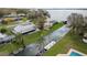 Waterfront homes in a serene neighborhood, each with private docks and lush landscaping at 5716 Gibson Shores Dr, Lakeland, FL 33809