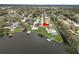 Waterfront homes in a serene neighborhood, each with private docks and lush landscaping at 5716 Gibson Shores Dr, Lakeland, FL 33809