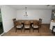 Bright dining room with a wooden table, six chairs, and recessed lighting at 5716 Gibson Shores Dr, Lakeland, FL 33809