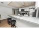 Updated kitchen featuring granite countertops and stainless steel appliances at 5716 Gibson Shores Dr, Lakeland, FL 33809