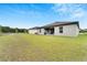 Spacious backyard featuring a lush lawn and serene view at 6296 Dolostone Dr, Lakeland, FL 33811