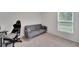 Bedroom featuring modern furnishings including a futon, desk and computer at 6296 Dolostone Dr, Lakeland, FL 33811