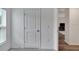 Bright bedroom featuring a window and a white door at 6296 Dolostone Dr, Lakeland, FL 33811