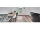 Dining room boasts wood-look flooring and a stylish table set at 6296 Dolostone Dr, Lakeland, FL 33811