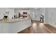 Open concept kitchen with stainless steel appliances and granite countertops at 6296 Dolostone Dr, Lakeland, FL 33811
