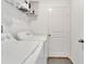 Bright laundry room with washer and dryer hookups at 6296 Dolostone Dr, Lakeland, FL 33811