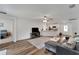 Bright living room with an open layout flowing into the kitchen area at 6296 Dolostone Dr, Lakeland, FL 33811
