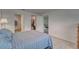A bedroom featuring a bed, a doorway, and a closet at 6296 Dolostone Dr, Lakeland, FL 33811