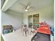 Covered patio with ceiling fan, grill, and seating at 6296 Dolostone Dr, Lakeland, FL 33811