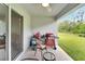 Outdoor patio featuring a grill and seating with backyard view at 6296 Dolostone Dr, Lakeland, FL 33811