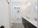 Bathroom features double sinks, marble counters, and sleek fixtures at 631 W Park St, Lakeland, FL 33803
