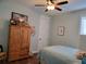 Cozy bedroom featuring a wooden wardrobe and comfortable furnishings at 631 W Park St, Lakeland, FL 33803