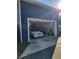 Garage interior with a car parked inside, and a view of items stored in back at 631 W Park St, Lakeland, FL 33803