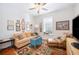 Living room provides a cozy sitting area with sofa and decor at 631 W Park St, Lakeland, FL 33803