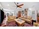Well-lit living area showcasing hardwood floors and eclectic decor at 631 W Park St, Lakeland, FL 33803