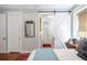 Main bedroom shows a barn door access to an ensuite bath at 631 W Park St, Lakeland, FL 33803
