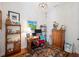 Office space with hardwood floors, ample storage, and a desk at 631 W Park St, Lakeland, FL 33803