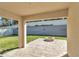 Inviting backyard patio featuring a built-in fire pit and well-maintained lawn at 6769 Se 3Rd Loop, Ocala, FL 34472