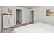 Bedroom showcasing a neutral color palette, white doors, and white bedroom set at 6769 Se 3Rd Loop, Ocala, FL 34472