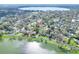 Aerial view of the neighborhood showcasing the property's location near a serene lake at 810 Orange Park Ave, Lakeland, FL 33801