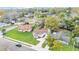 Aerial view of the home showcasing its landscaping and proximity to local neighborhood at 827 Sikes Blvd, Lakeland, FL 33815