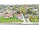Street view of a charming single-Gathering home with a well-maintained lawn and inviting curb appeal at 827 Sikes Blvd, Lakeland, FL 33815