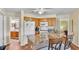An efficient kitchen connects the dining area with a bathroom and a doorway to what may be the main bedroom at 8303 Waterview Way # 8303, Winter Haven, FL 33884