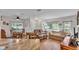 The combined living and dining area allows for versatile furniture arrangements and flexibility in decor at 8303 Waterview Way # 8303, Winter Haven, FL 33884