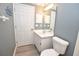 Bathroom featuring a toilet, sink, vanity and medicine cabinet at 1065 Jordan Rd, Lakeland, FL 33811