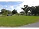 A home surrounded by a lush front yard at 1065 Jordan Rd, Lakeland, FL 33811