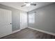 Bedroom features new floors, a window, a closet, and a ceiling fan at 1100 Lowry Ave # 51, Lakeland, FL 33801