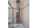 Updated shower with multi-function control panel and tile surround with glass door at 1100 Lowry Ave # 51, Lakeland, FL 33801