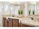 Bathroom featuring a double vanity, tile floor and quartz countertop at 1108 Stoney Creek Blvd, Lakeland, FL 33811