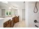 Bathroom featuring double vanity, tile shower, and tile floor at 1108 Stoney Creek Blvd, Lakeland, FL 33811