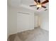 Bedroom featuring a double closet and neutral carpet at 1108 Stoney Creek Blvd, Lakeland, FL 33811