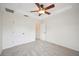 Bedroom featuring a double closet and neutral carpet at 1108 Stoney Creek Blvd, Lakeland, FL 33811