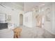 Bright, airy living room with high ceilings, neutral tones, and lots of natural light from nearby windows at 1108 Stoney Creek Blvd, Lakeland, FL 33811