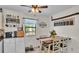 Bright dining area with a wooden table, seating for four, and charming decorative elements at 111 Klein Ct, Lakeland, FL 33813