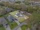 Aerial view of the property showing the house, yard, and neighborhood at 1415 Pinewood Ave, Lakeland, FL 33803