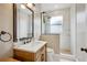 Updated bathroom with subway tile shower and modern vanity at 1618 Robertson St, Lakeland, FL 33803