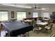 Large community room offering various seating options and recreational activities at 1700 6Th Nw St # A36, Winter Haven, FL 33881