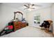 Bedroom features a large dresser and window at 1888 Creeks Vista Blvd, Lakeland, FL 33810