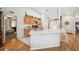 Bright kitchen with quartz countertops, ample cabinetry, and bar-style seating at 1888 Creeks Vista Blvd, Lakeland, FL 33810