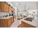 Spacious kitchen with stainless steel appliances, tile floors, and a view into the living area at 1888 Creeks Vista Blvd, Lakeland, FL 33810