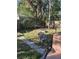 Backyard showing chair and fence at 2014 S Lake Cannon Nw Dr, Winter Haven, FL 33881