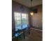 Cozy dining area with a window overlooking the backyard at 2051 Winterset Dr, Lakeland, FL 33813